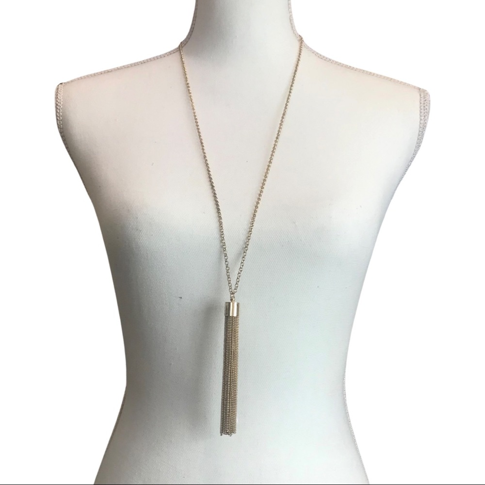 Long gold tone tassel necklace